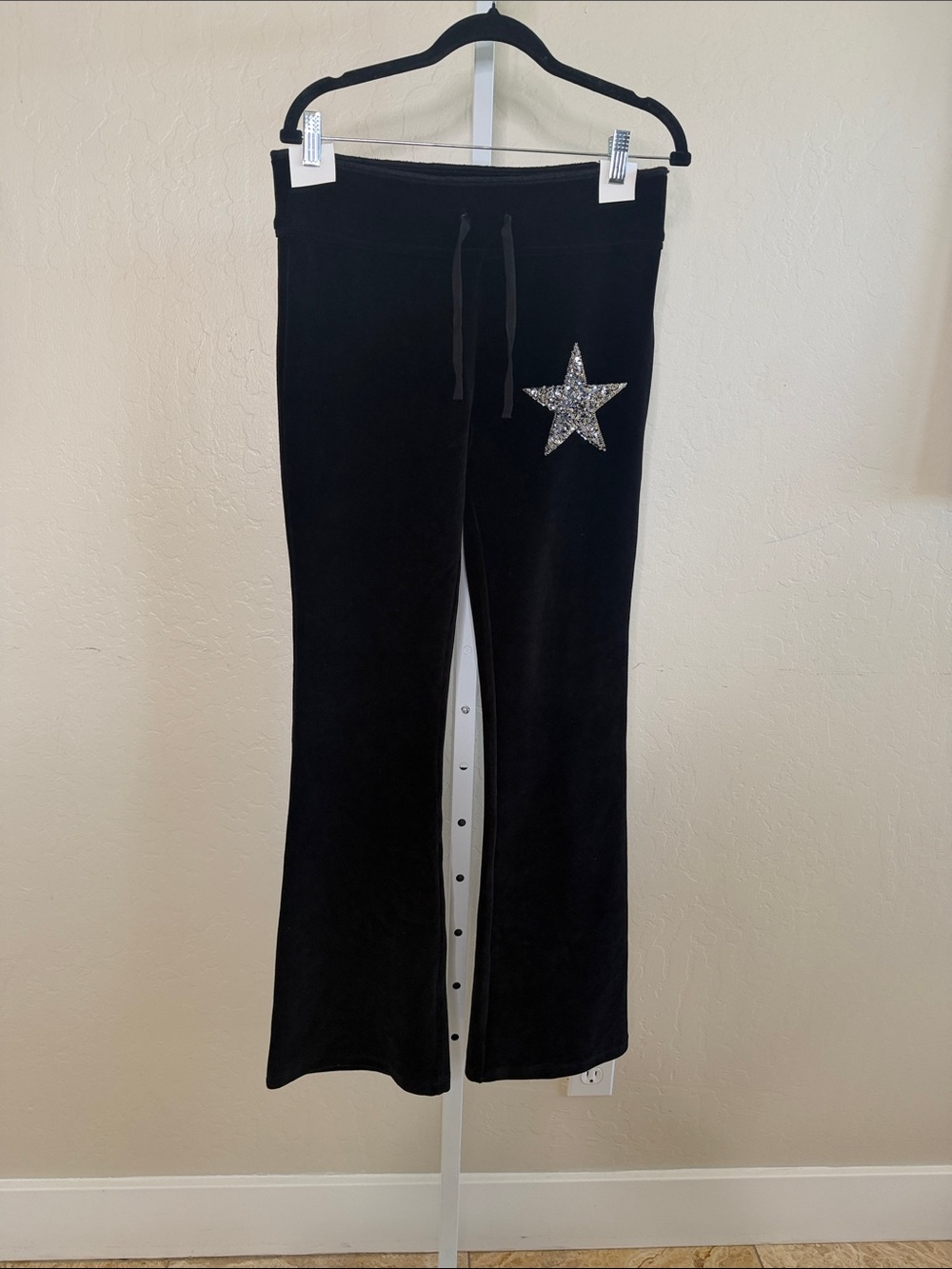 Chaser NWOT S Black Slightly flared Velour feel pants w/ silver star